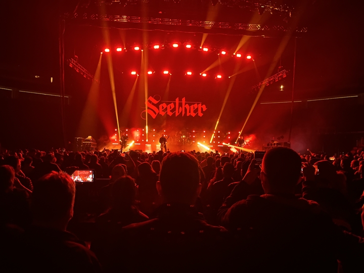 Energetic concert crowd at Seether concert 2025